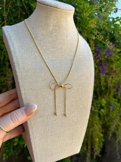 Gold Gold Bow Necklace from PinkyBelles Shop