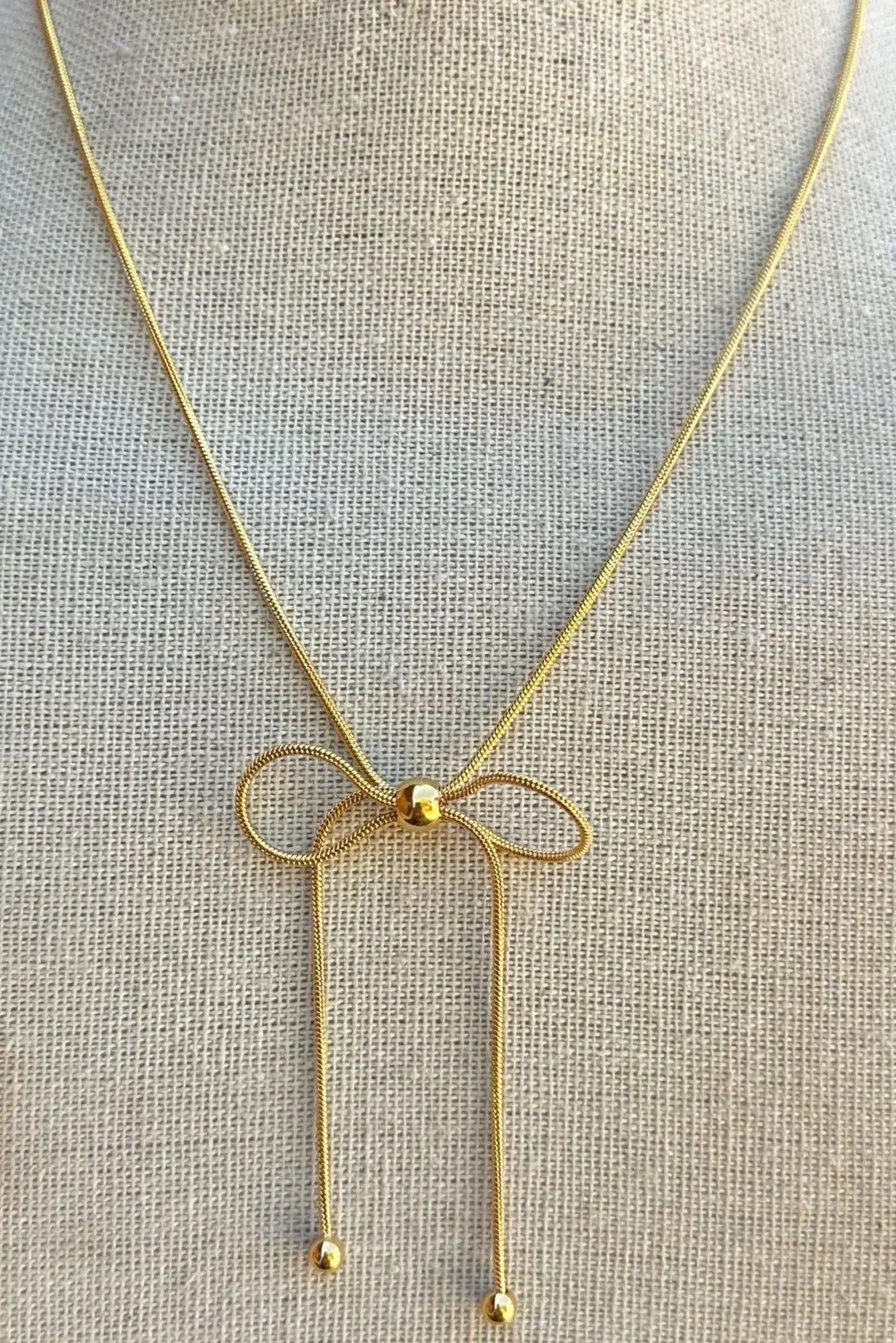 Gold Gold Bow Necklace from PinkyBelles Shop